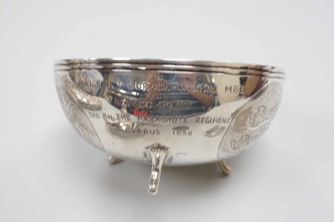 A late Victorian repousse silver navette shaped dish, by Charles Edwards, London, 1894, 25.7cm, with engraved monogram and date, together with a pair of mid 18th century silver sugar nips, an early 19th century silver vi
